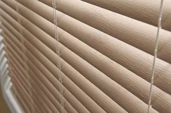 Horizontal Blinds installed in a bright living room