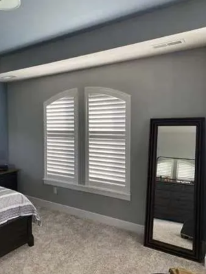 Specialty Shaped Shutters with adjustable louvers in home