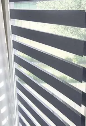 Modern Layered/Zebra Shades in home interior setting