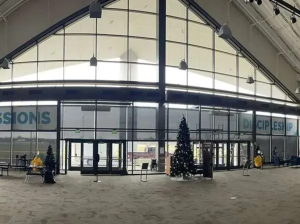 Commercial Shades providing filtered light in room