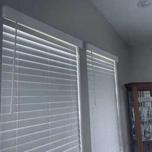 Cordless Faux Wood Blinds covering large window with natural light