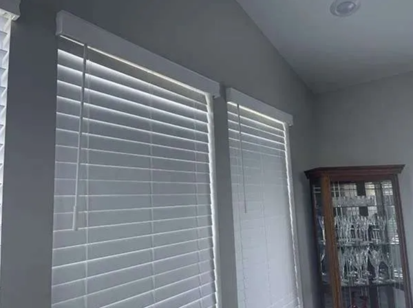 Cordless Faux Wood Blinds covering large window with natural light